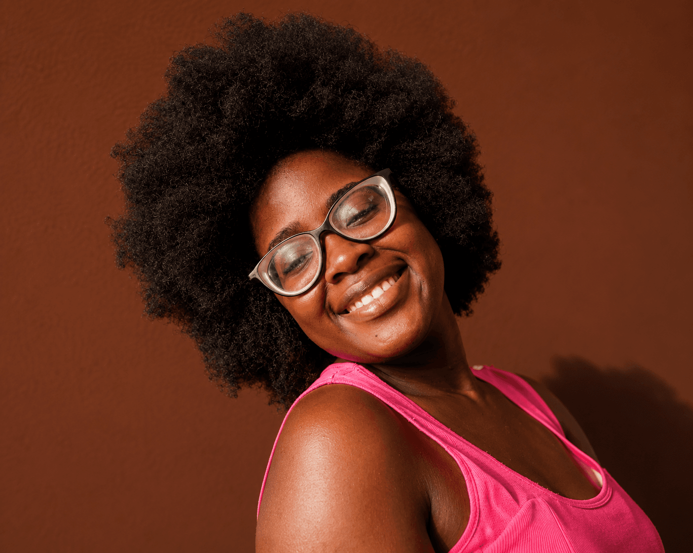 Natural hair portrait with glasses