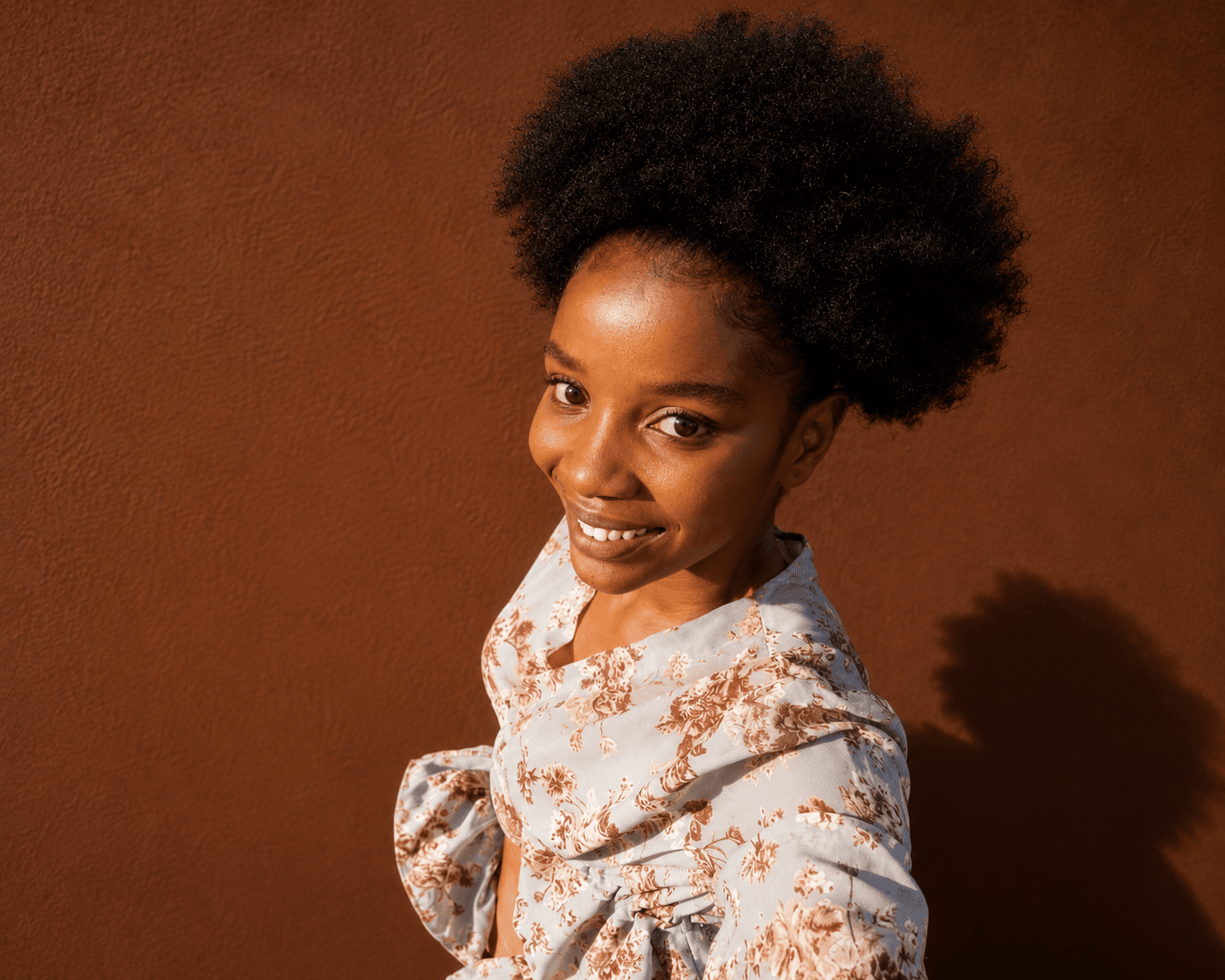 Natural hair portrait in floral top